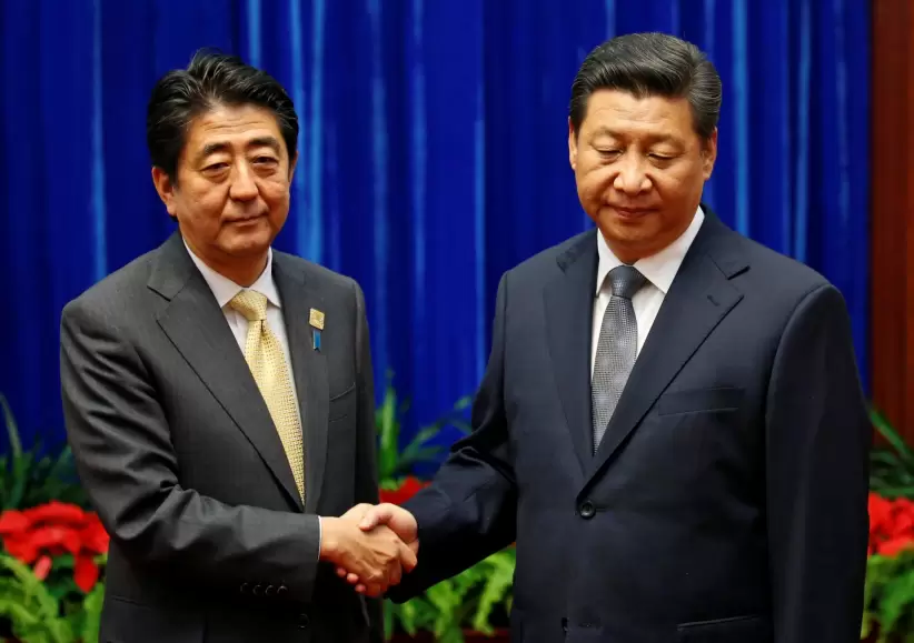 Shinzo Abe y Xi Jimping