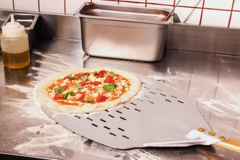 pizza antes de entrar al horno pizza data