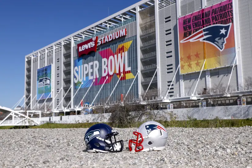 SANTA CLARA, CALIFORNIA- FEBRUARY 4: A general view of the Seattle Seahawks helmet and New England Patriots helmet displayed in outside of the Levi's 