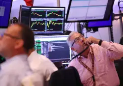 La advertencia de un fondo de US$ 70.000 millones: la IA ya está reemplazando tareas clave en Wall Street 